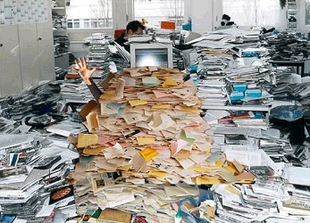 A typical MMLS newcomer drowning in paperwork.